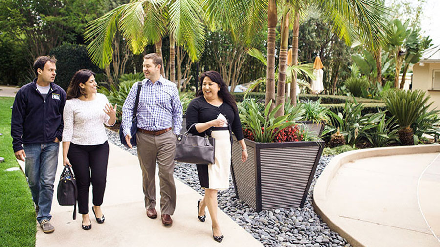 Executive MBA students taking a break outside in Los Angeles